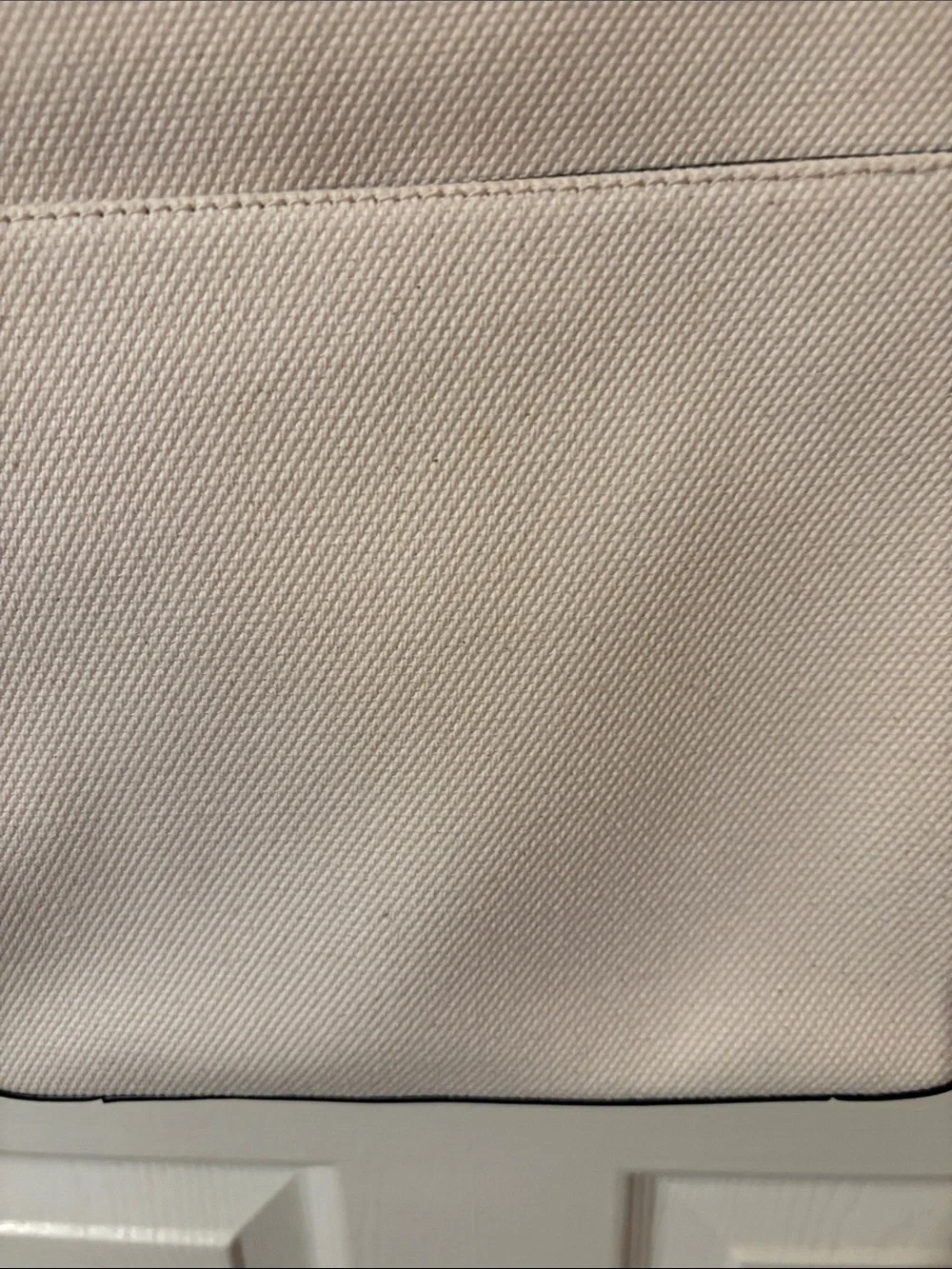 Mk  Beige Tote with Black and White Center Stripe. new w/o tags. Stiff until use